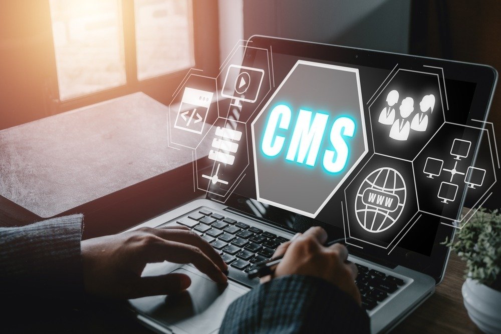 Cms,,Content,Management,System,Concept,,Person,Hand,Using,Laptop,Computer