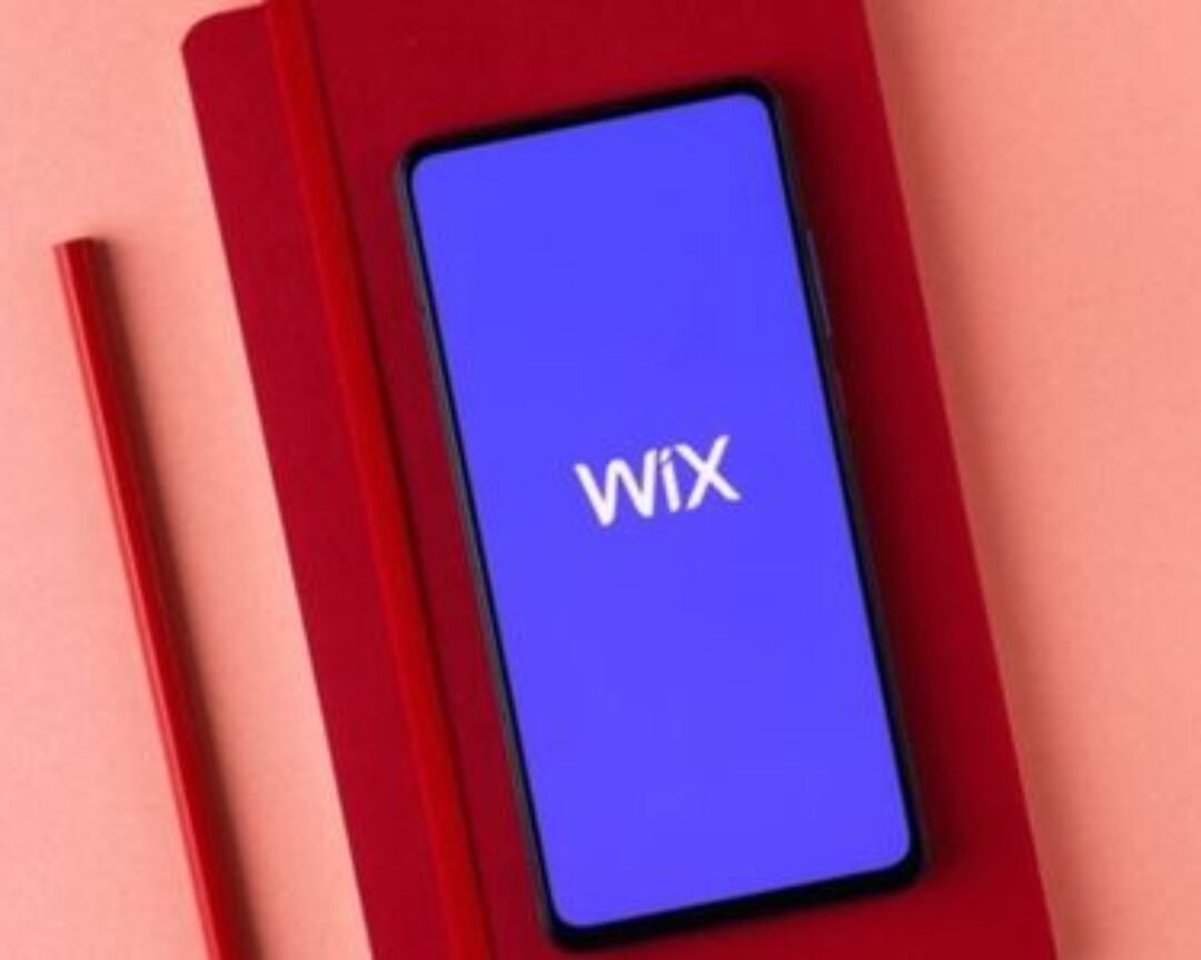 Website owner granting Wix Manager access to a team member for secure website management and collaboration.