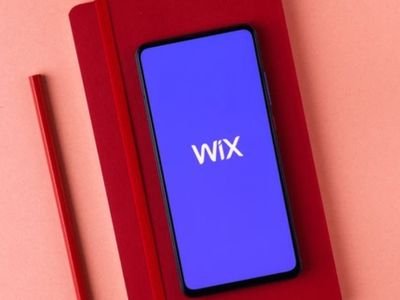 Website owner granting Wix Manager access to a team member for secure website management and collaboration.